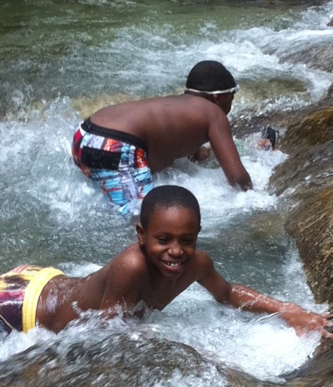 Boys playing Dunn's River Falls